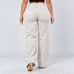 White Leopard jeans, Back view, walking