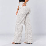 White Leopard jeans, Back three-quarter, hand in pocket